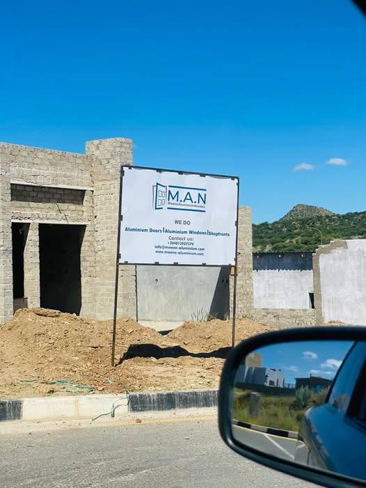 M.A.N Mwene Aluminium Namibia signage on a residential building site in Windhoek